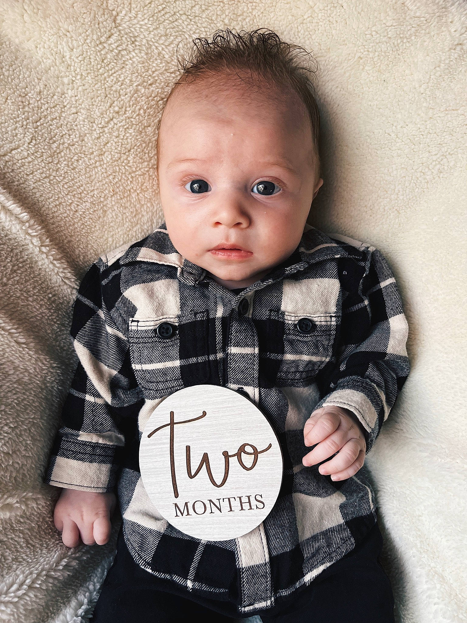 Wade is registered to the contest to win money with this photo: baby, baby_toddler_clothing, cheek, child, collar, dress_shirt, flash_photography, grey, happy, iris, monochrome_photography, outerwear, pattern, person, plaid, portrait_photography, sitting, sleeve, t_shirt, tartan