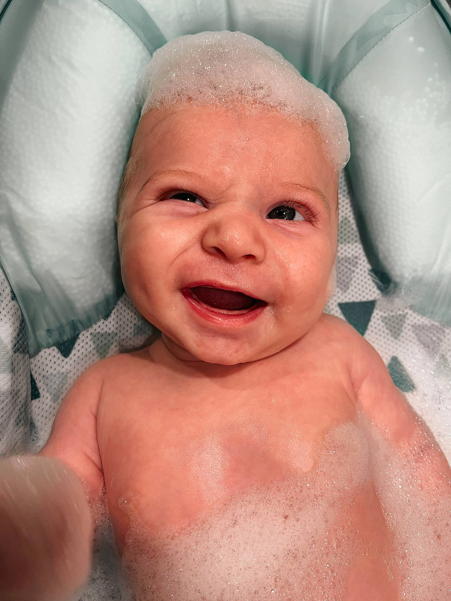 Wade is registered to the contest to win money with this photo: baby, baby_bathing, bathing, cheek, ear, eye, eyebrow, face, facial_expression, forehead, head, human_body, jaw, lip, mouth, muscle, nose, person, skin, smile