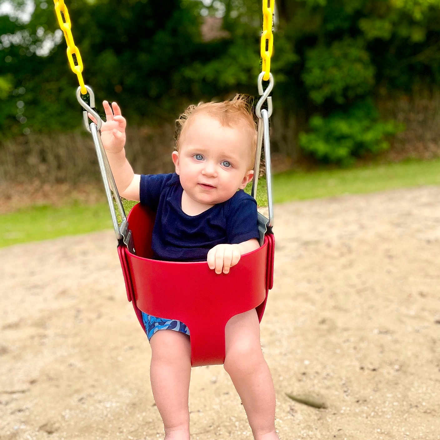 Ronald joined the competition — help win amazing prizes! toddler, child, swing, playground, outdoor, baby, sand, red_swing, blue_shirt, barefoot, grass, trees, nature, summer, happy, cute, fun, play, park, portrait