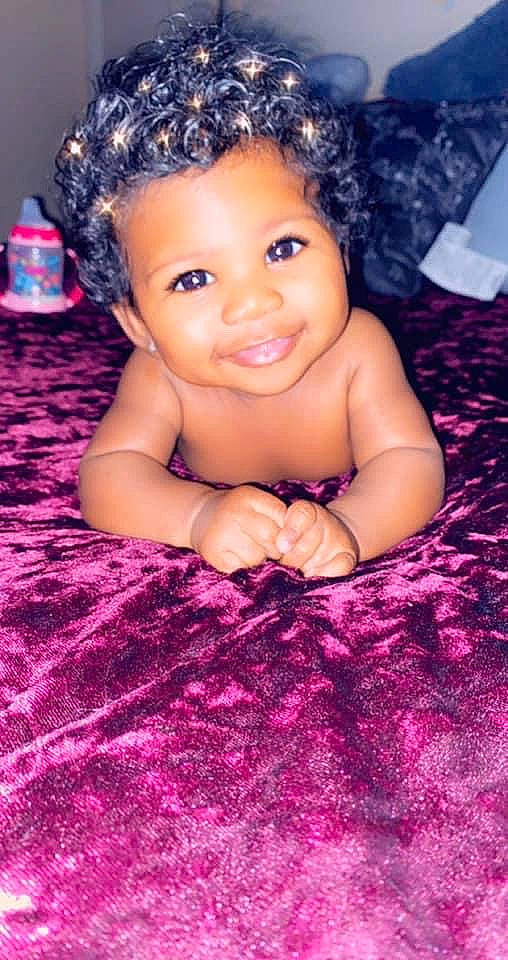 Laylah joined the competition — help win amazing prizes! arm, black_hair, chin, cool, eye, eyebrow, finger, flash_photography, hairstyle, happy, head, iris, joy, lip, magenta, person, pink, purple, red, skin