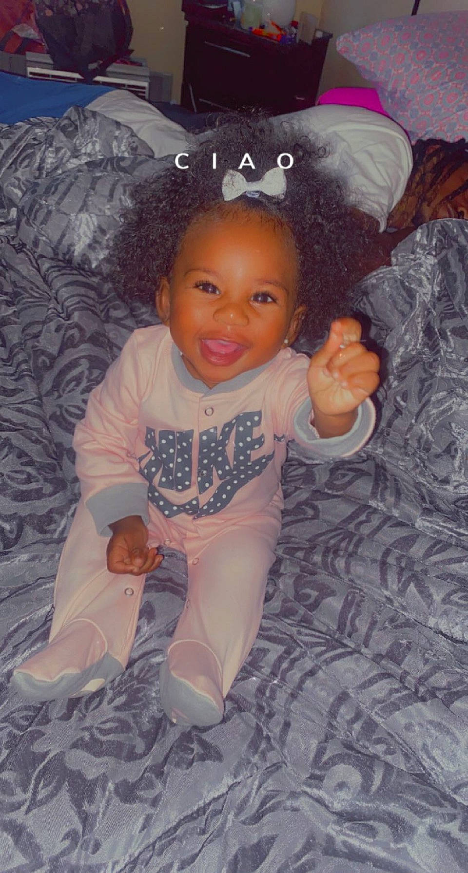 Laylah joined the competition — help win amazing prizes! arm, baby_toddler_clothing, brown, cheek, comfort, cool, eye, finger, hair, hairstyle, hand, head, iris, nose, organ, person, pink, skin, sleeve, smile