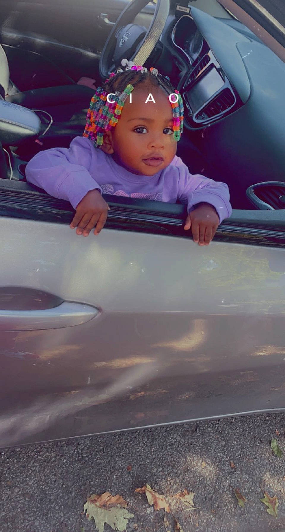 Laylah is registered to the contest to win money with this photo: auto_part, automotive_design, automotive_exterior, automotive_lighting, automotive_wheel_system, baby, baby_carriage, baby_toddler_clothing, bumper, child, fun, happy, hood, motor_vehicle, person, personal_luxury_car, pink, steering_wheel, toddler, trunk