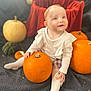 River-Lavinia joined the competition — help win amazing prizes! baby, child, pumpkin, autumn, orange, white_clothing, tights, sitting, smile, cute, indoor, soft_light, blanket, seasonal, fall, decor, plaid_skirt, toddler, happy, portrait