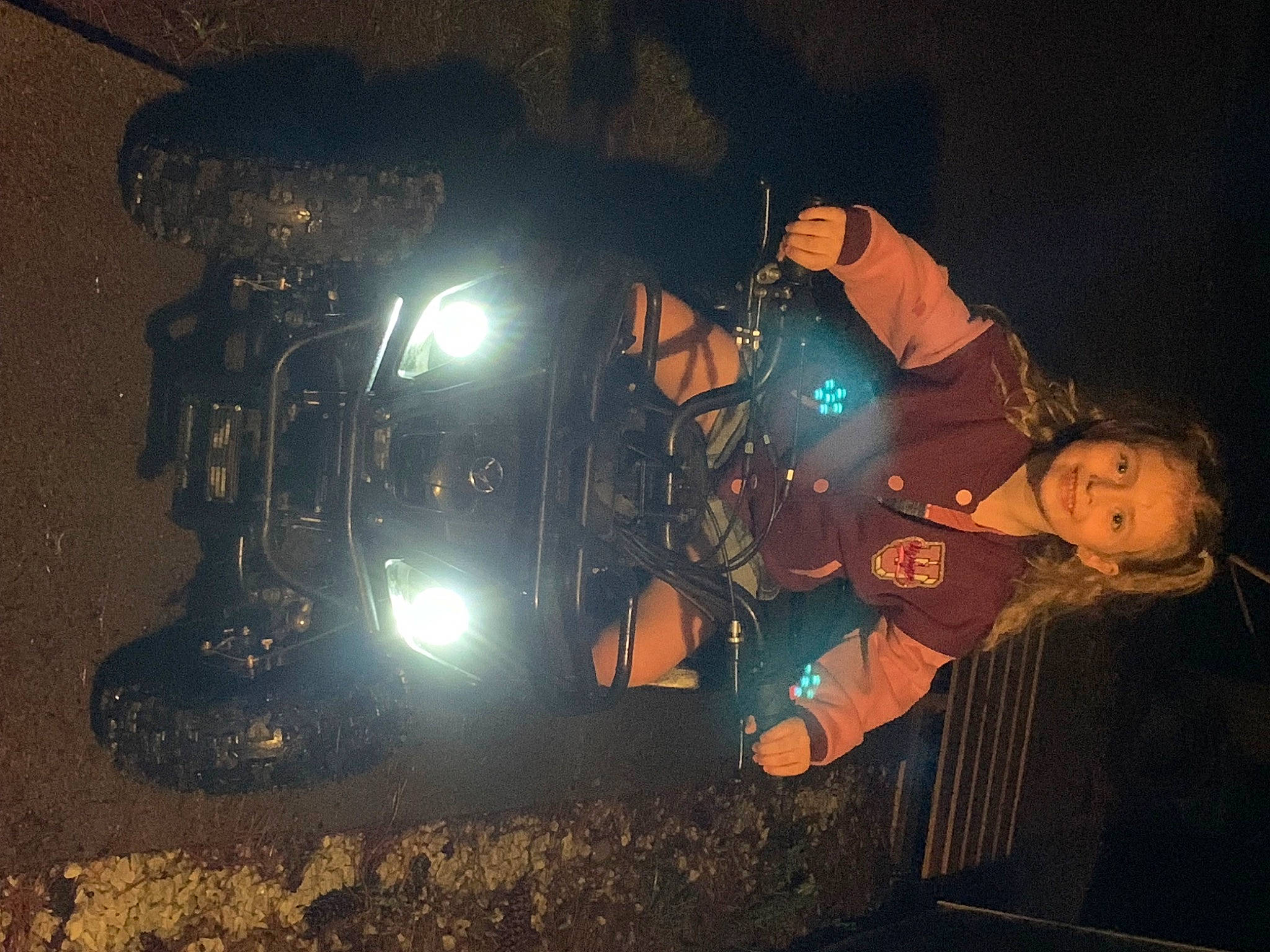 Layla is registered to the contest to win money with this photo: asphalt, auto_part, automotive_lighting, automotive_tire, automotive_wheel_system, blue_collar_worker, darkness, electric_blue, event, fender, flash_photography, fun, gas, headlamp, helmet, joy, lens_flare, midnight, person, personal_protective_equipment