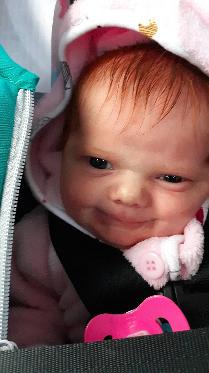 Christine is registered to the contest to win money with this photo: baby, baby_products, cheek, child, eye, eyelash, face, head, headgear, lip, mouth, nose, person, pink, product, skin, smile, toddler