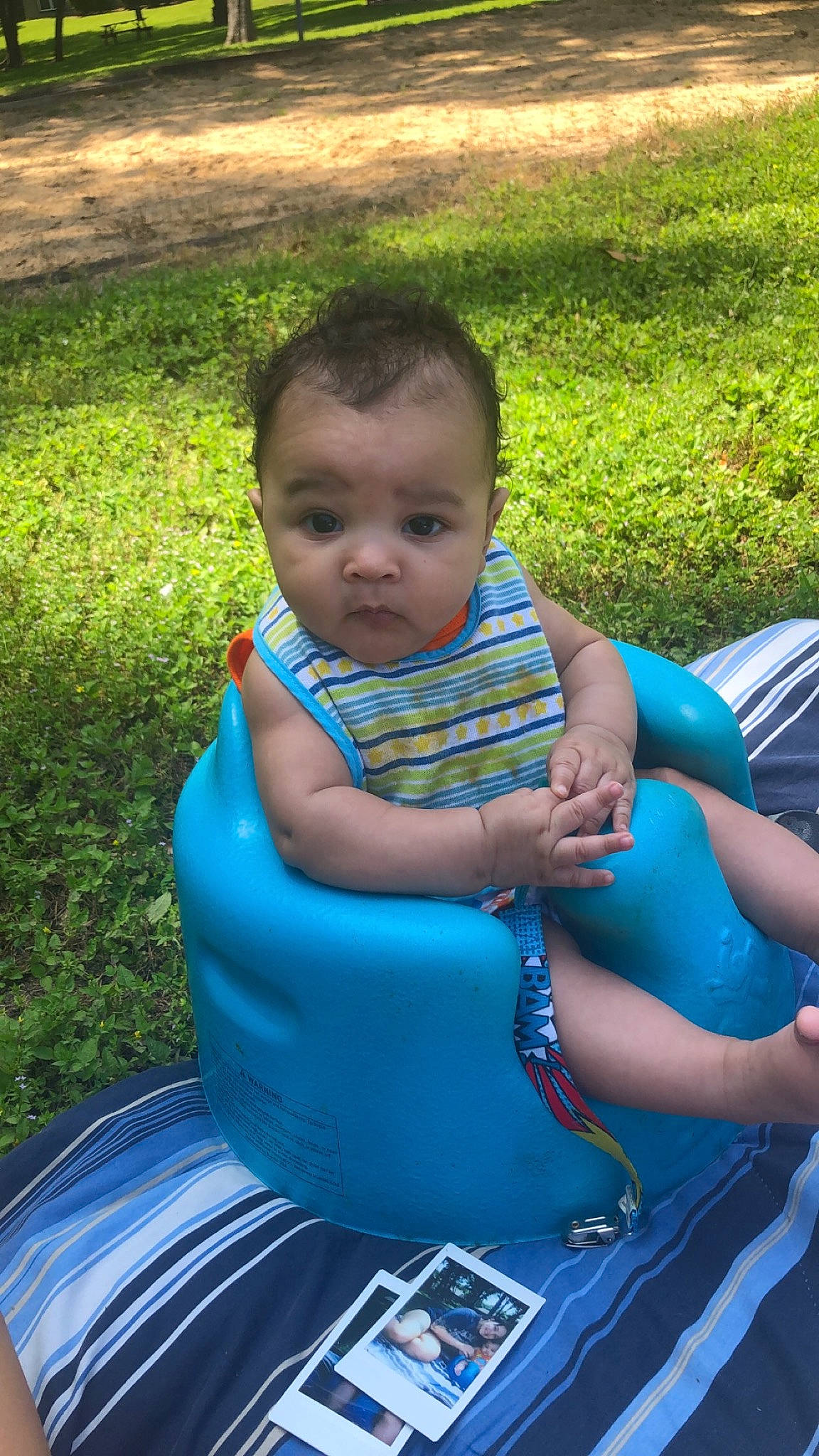 Rodney is registered to the contest to win money with this photo: child, grass, leisure, person, sitting, summer, toddler, vacation