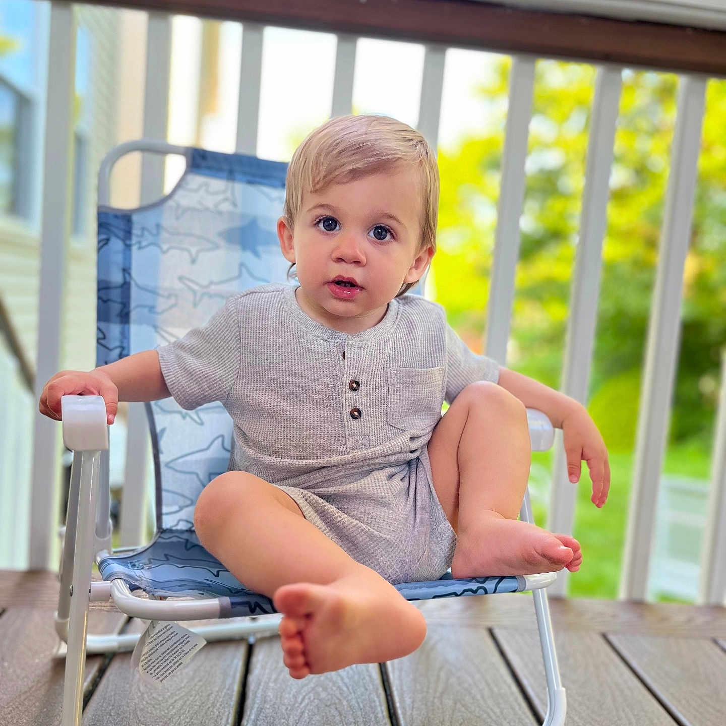 Jaxson joined the competition — help win amazing prizes! architecture, baby, balcony, bodypart, building, chair, face, finger, furniture, hand, head, house, housing, indoors, interiordesign, person, photography, portrait, sitting, summer