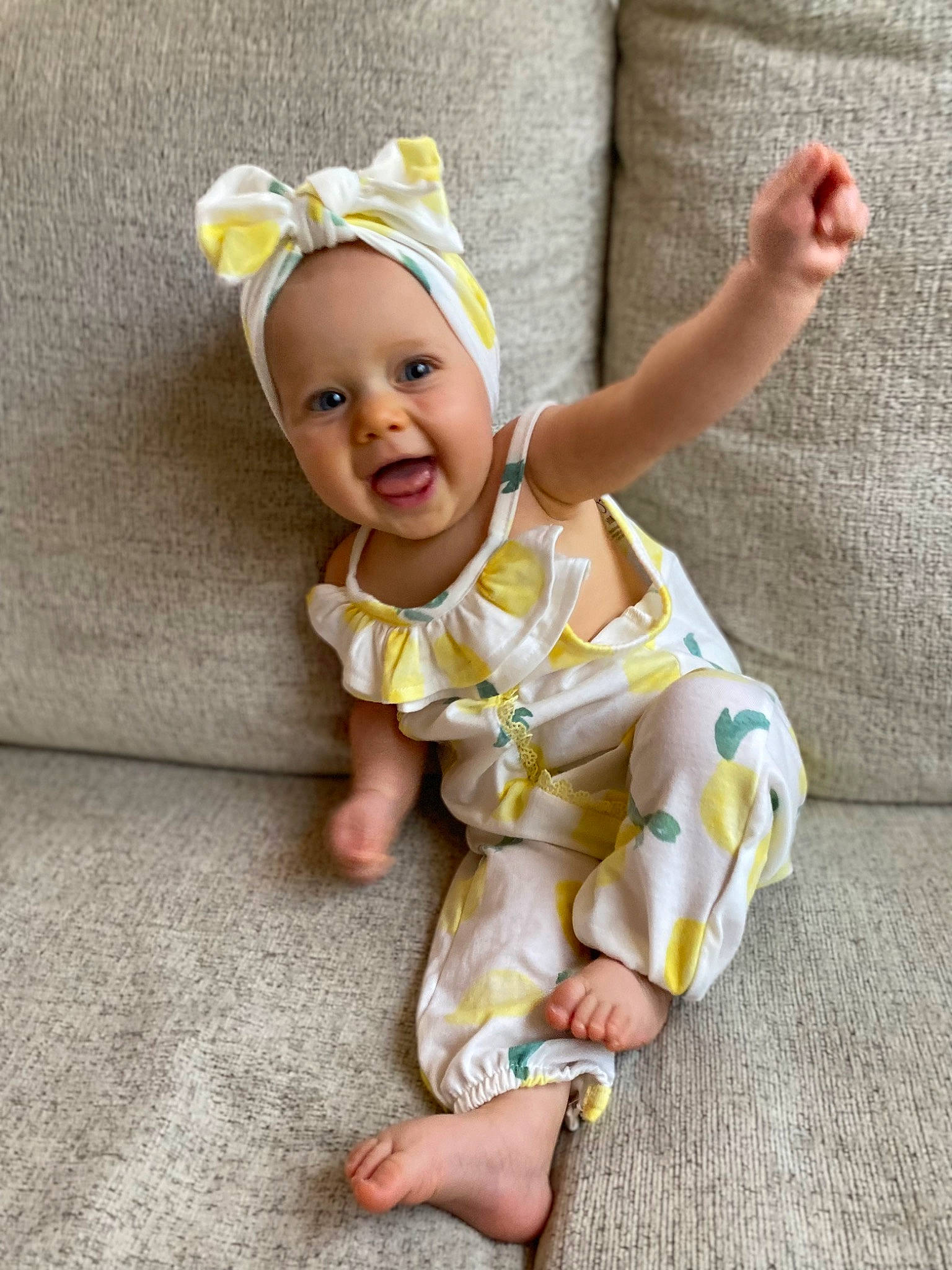 Karlee joined the competition — help win amazing prizes! baby, baby_toddler_clothing, child, dress, eye, fashion_accessory, finger, foot, happy, hat, headband, human_body, nail, person, sitting, skin, sleeve, smile, thumb, toddler