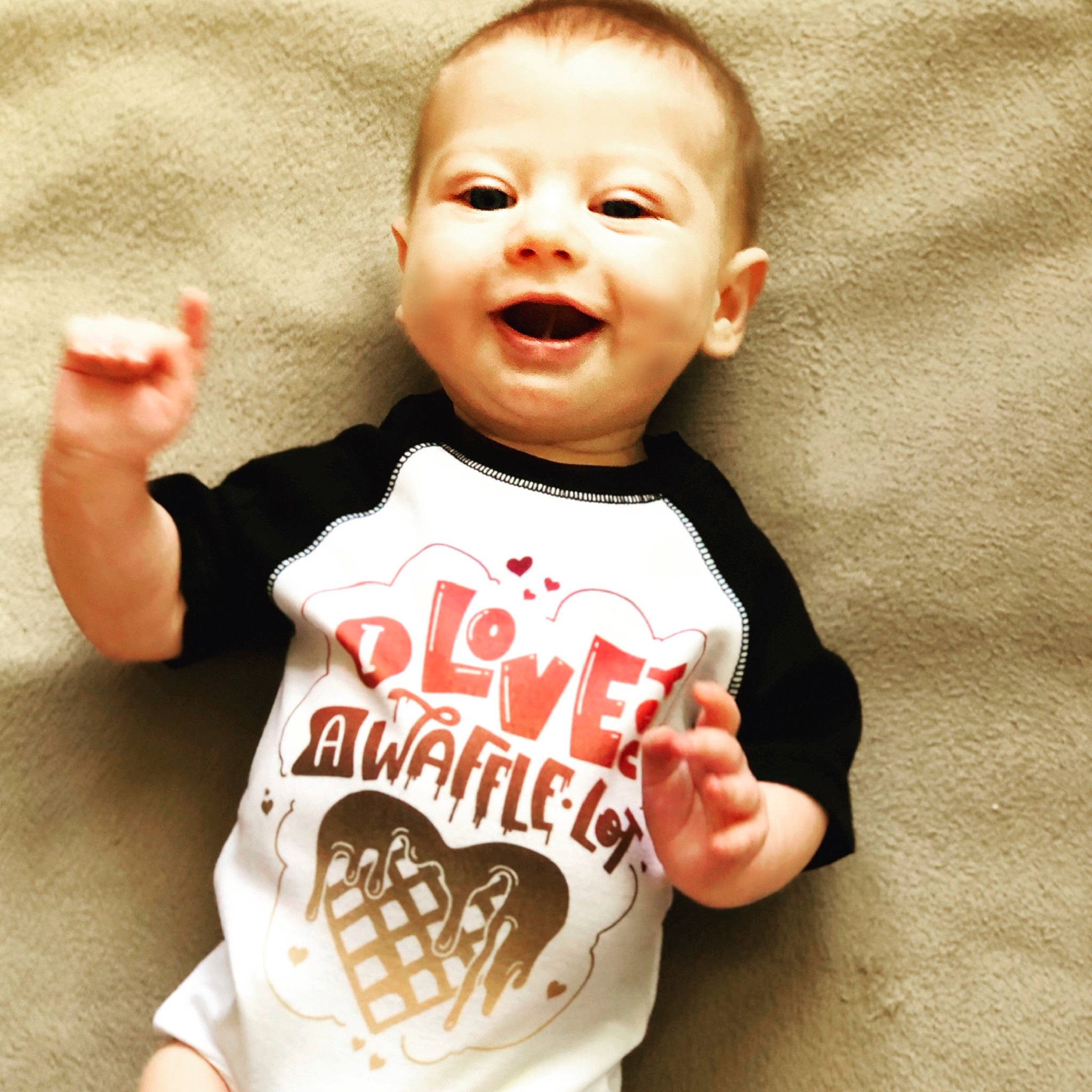 Hollis is registered to the contest to win money with this photo: baby, baby_toddler_clothing, child, cool, food, happy, person, product, sleeve, sweetness, t_shirt, toddler, top