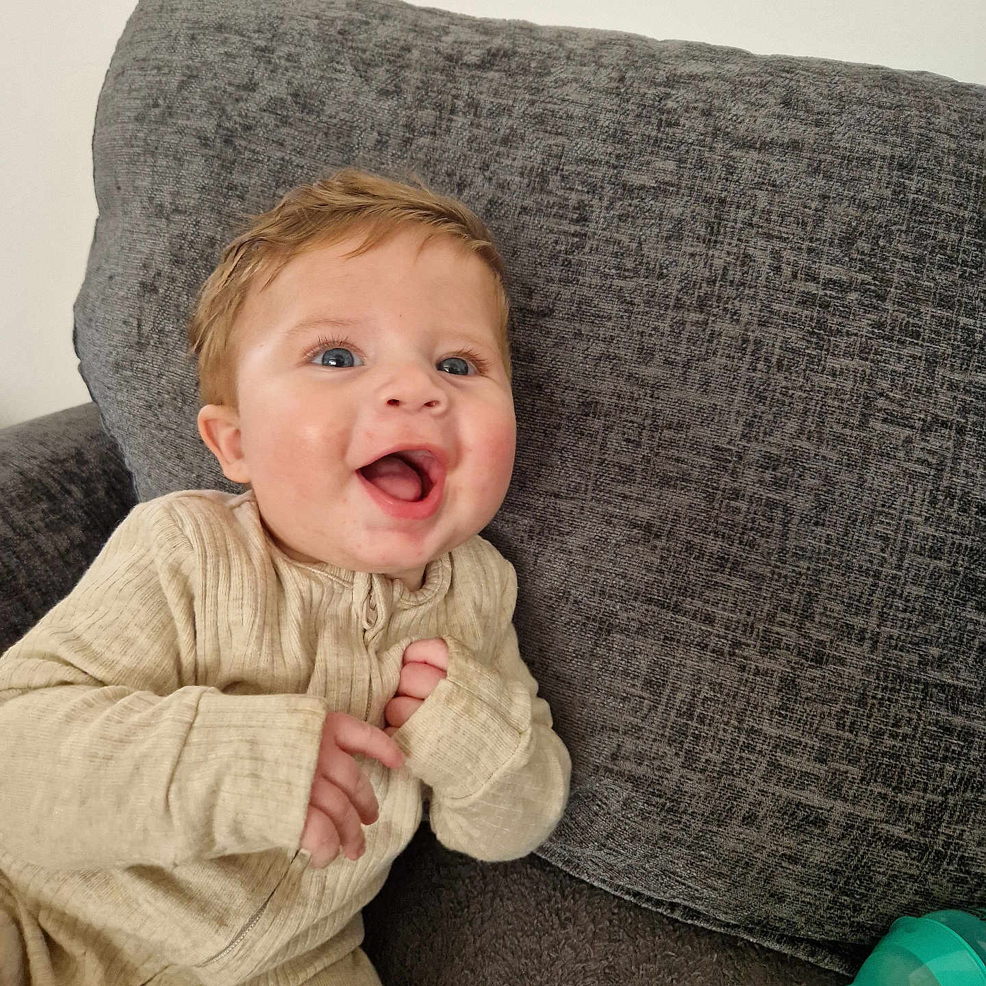 Brodin is registered to the contest to win money with this photo: baby, babylaughing, bodypart, clothing, couch, cushion, face, finger, furniture, hand, happy, head, homedecor, laughing, pants, person, photography, portrait, sitting, smile