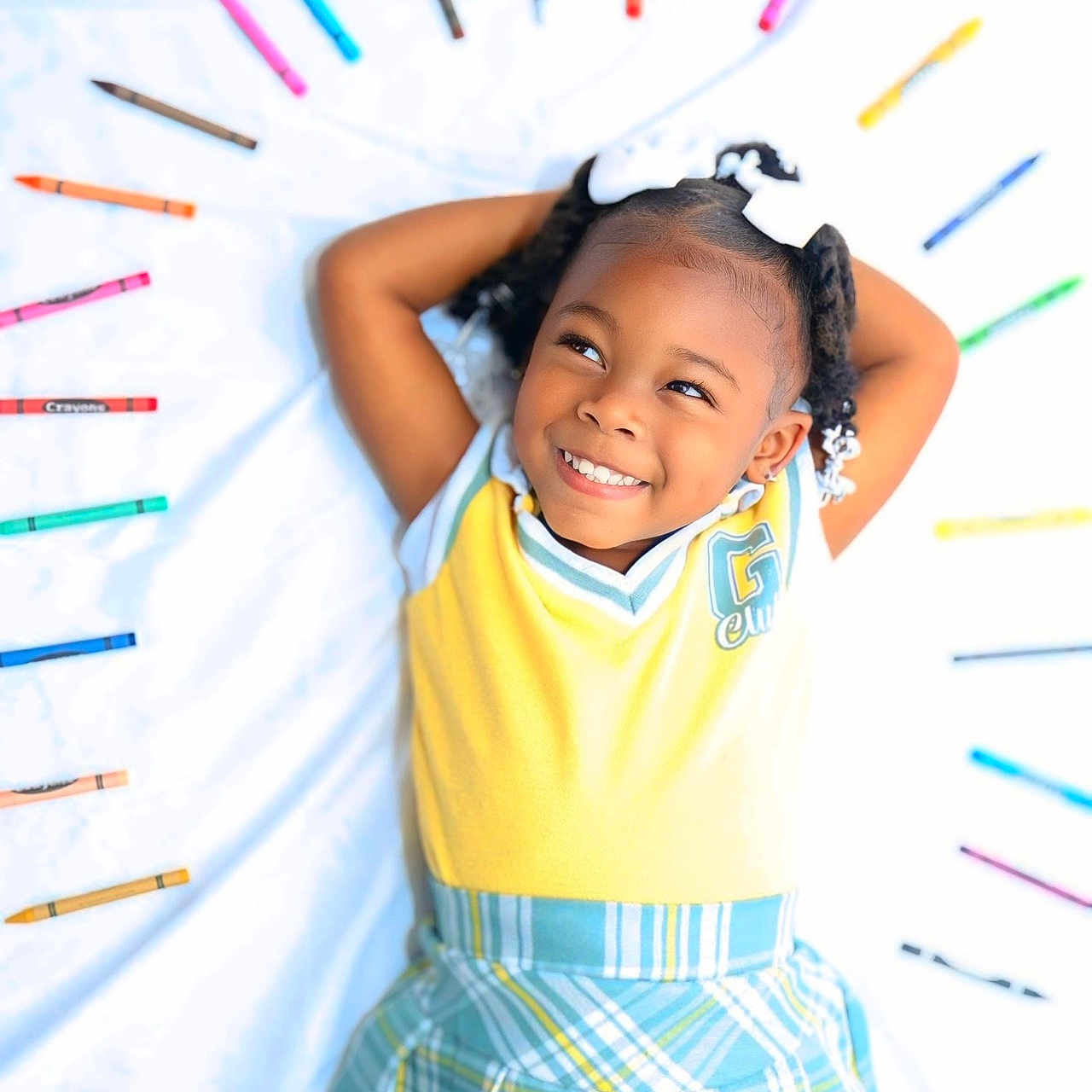 Alayah Luckett is registered to the contest to win money with this photo: accessories, bodypart, child, clothing, dress, earring, face, female, girl, happy, head, mouth, pen, person, photography, portrait, skirt, smile, t_shirt, teeth
