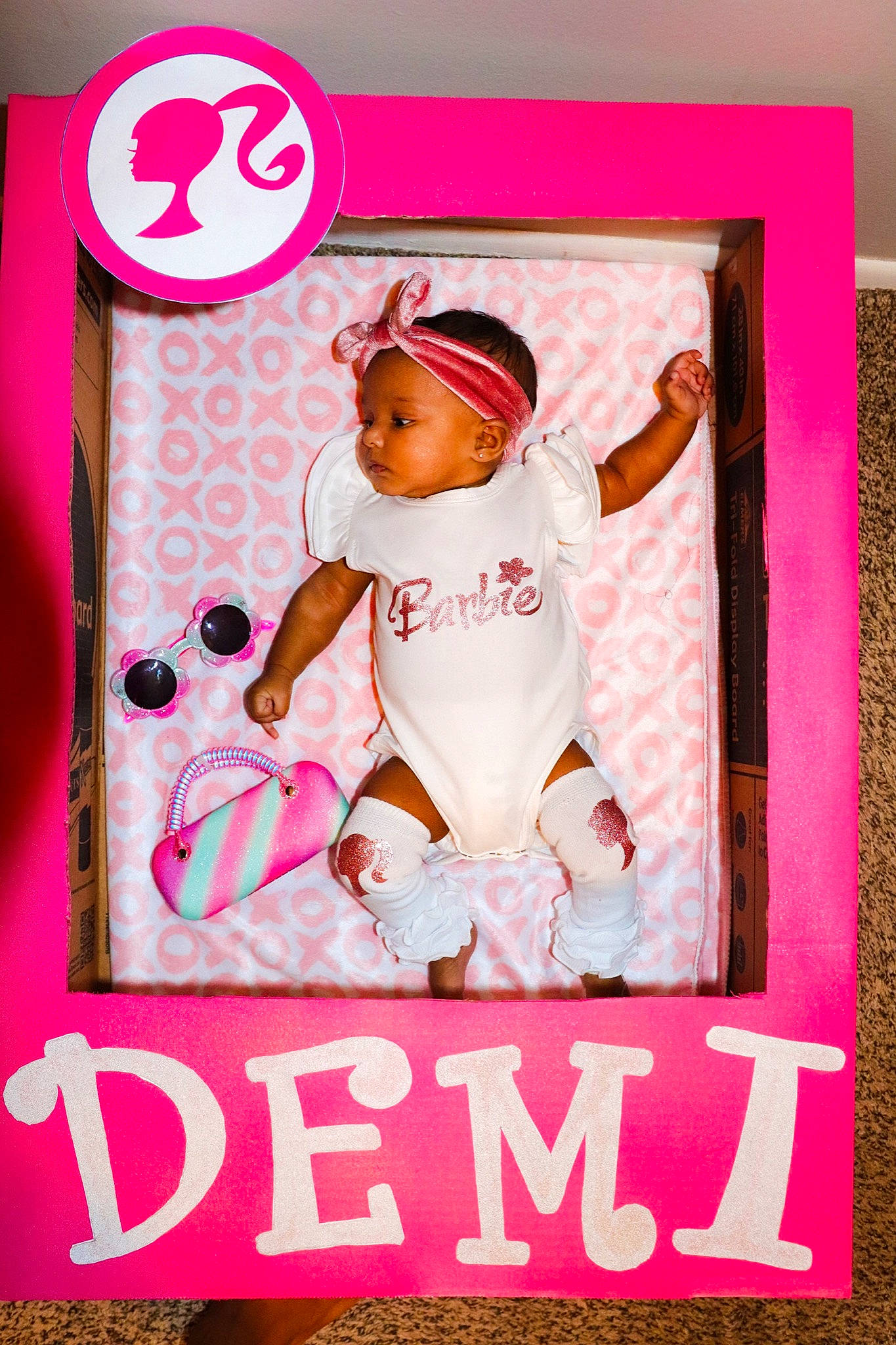 Demi joined the competition — help win amazing prizes! advertising, art, baby, baby_toddler_clothing, carmine, child, font, happy, logo, magenta, paper_product, pattern, peach, person, photo_caption, pink, poster, rectangle, sleeve, t_shirt