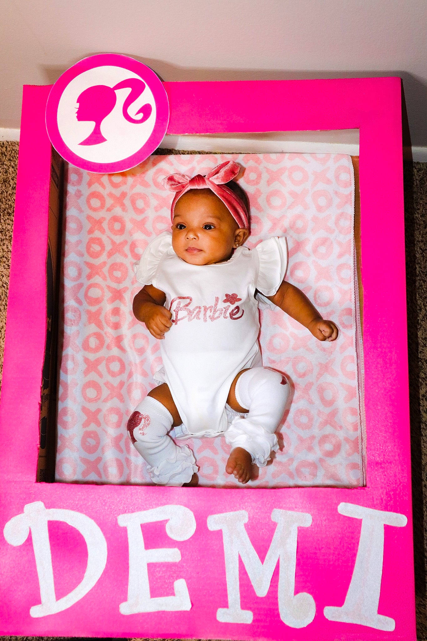 Demi joined the competition — help win amazing prizes! baby, baby_toddler_clothing, cake_decorating, carmine, child, font, glove, happy, icing, linens, magenta, pattern, peach, person, pink, product, rectangle, sleeve, sugar_cake, textile