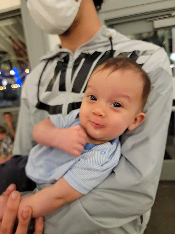 Kyrie joined the competition — help win amazing prizes! baby, baby_toddler_clothing, cheek, child, event, finger, fun, gesture, happy, person, portrait_photography, room, service, sitting, smile, thumb, toddler, vacation