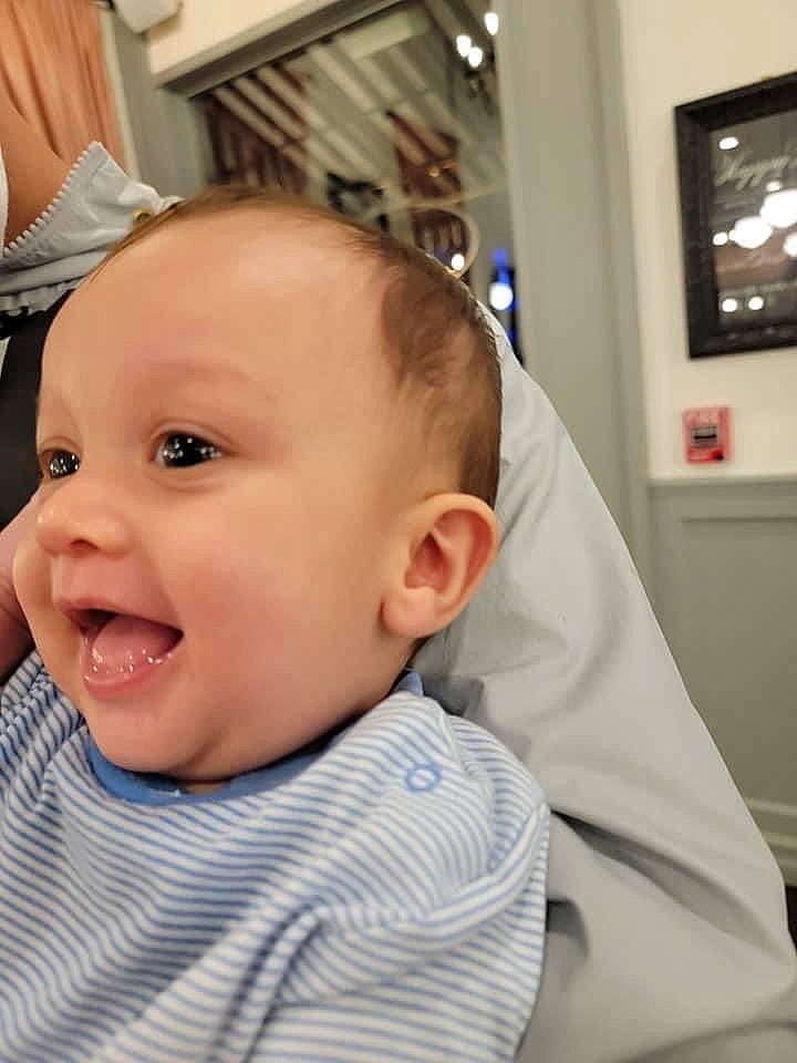 Kyrie is registered to the contest to win money with this photo: baby, baby_toddler_clothing, cheek, child, ear, eyebrow, eyelash, fashion_accessory, fun, happy, jaw, mouth, nose, person, picture_frame, sitting, skin, sleeve, smile, television