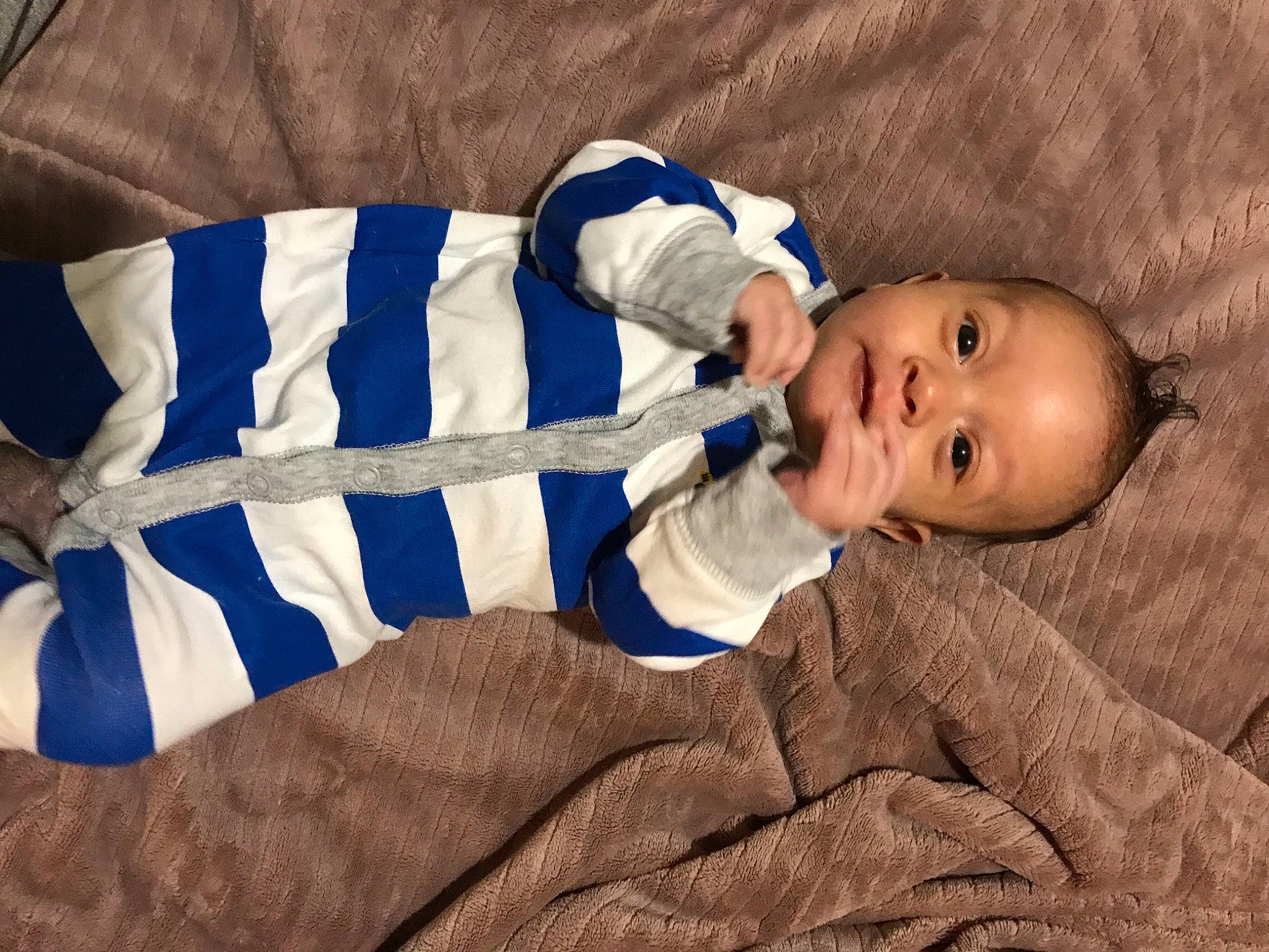 Kyrie joined the competition — help win amazing prizes! baby, baby_products, baby_safety, baby_toddler_clothing, child, comfort, electric_blue, eye, finger, head, linens, mammal, pattern, person, sitting, sleeve, sock, textile, toddler, tree