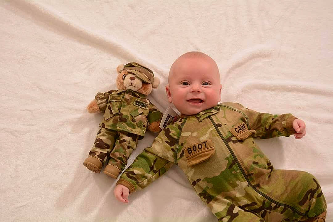 Jaxson is registered to the contest to win money with this photo: army, army_men, baby, camouflage, child, design, military, military_camouflage, military_uniform, pattern, person, soldier, toddler, uniform