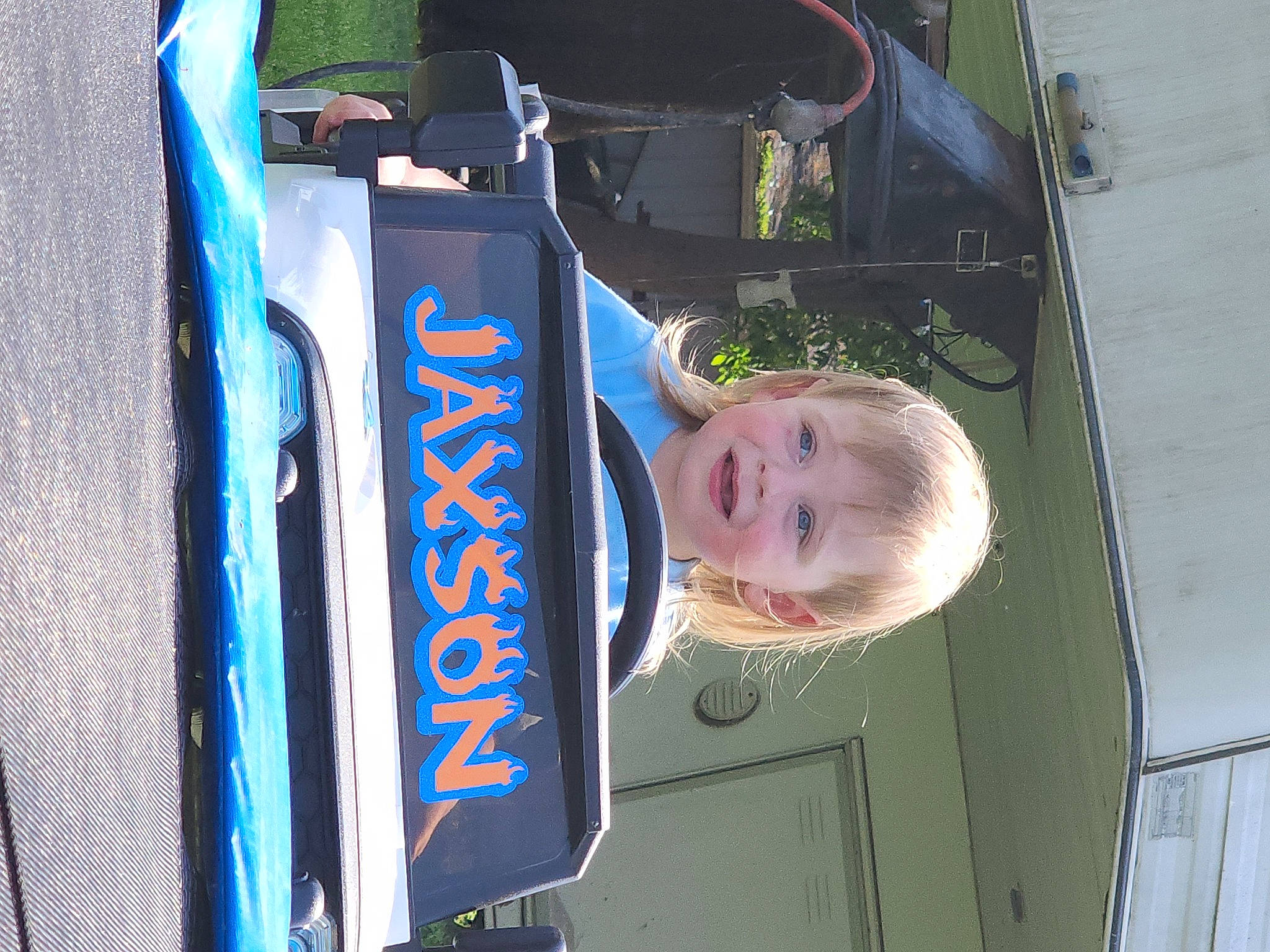 Jaxson joined the competition — help win amazing prizes! auto_part, automotive_design, automotive_exterior, automotive_window_part, bumper, design, electric_blue, fun, hood, joy, motor_vehicle, person, recreation, smile, t_shirt, toddler, transport, vehicle, vehicle_door, windshield