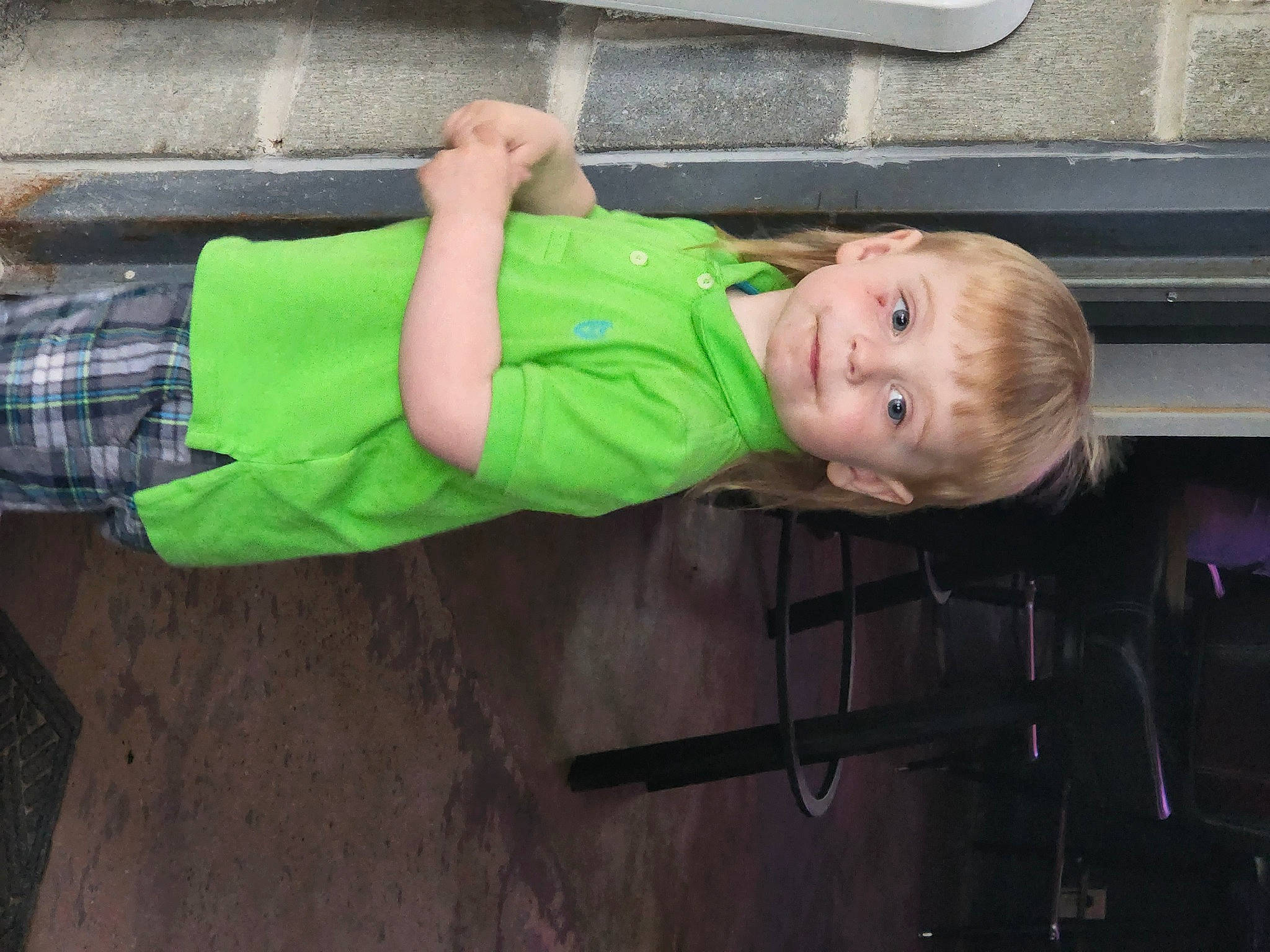 Jaxson is registered to the contest to win money with this photo: auto_part, automotive_exterior, baby, baby_toddler_clothing, bumper, chair, child, comfort, elbow, fun, human_body, leg, leisure, person, sitting, smile, t_shirt, toddler, wood