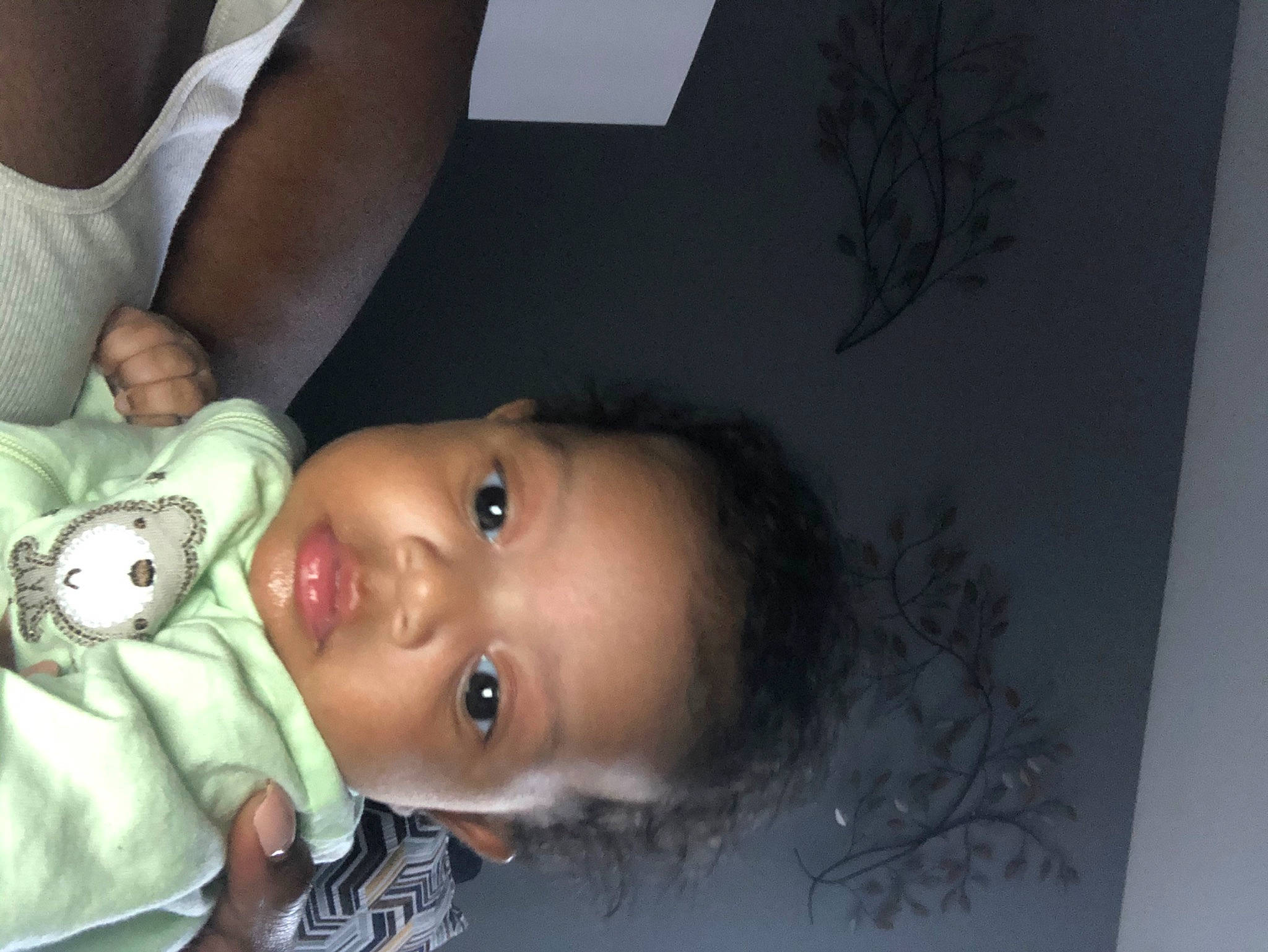 Phoenix is registered to the contest to win money with this photo: baby, black_hair, cheek, child, ear, eye, face, forehead, head, mouth, nose, person, skin, smile, toddler