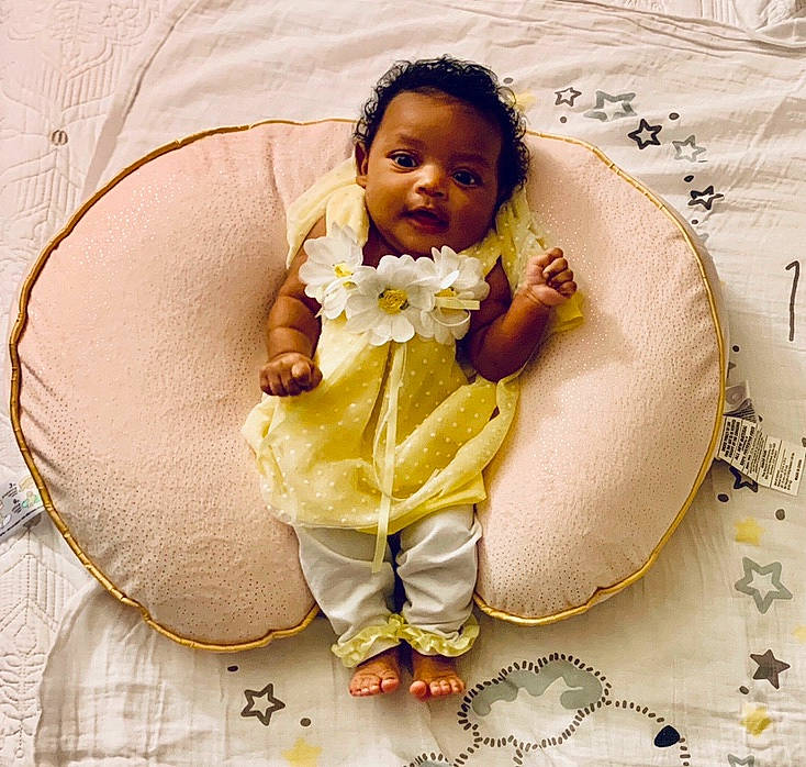 Phoenix is registered to the contest to win money with this photo: baby, baby_sleeping, bedding, child, happy, person, play, smile, toddler, yellow