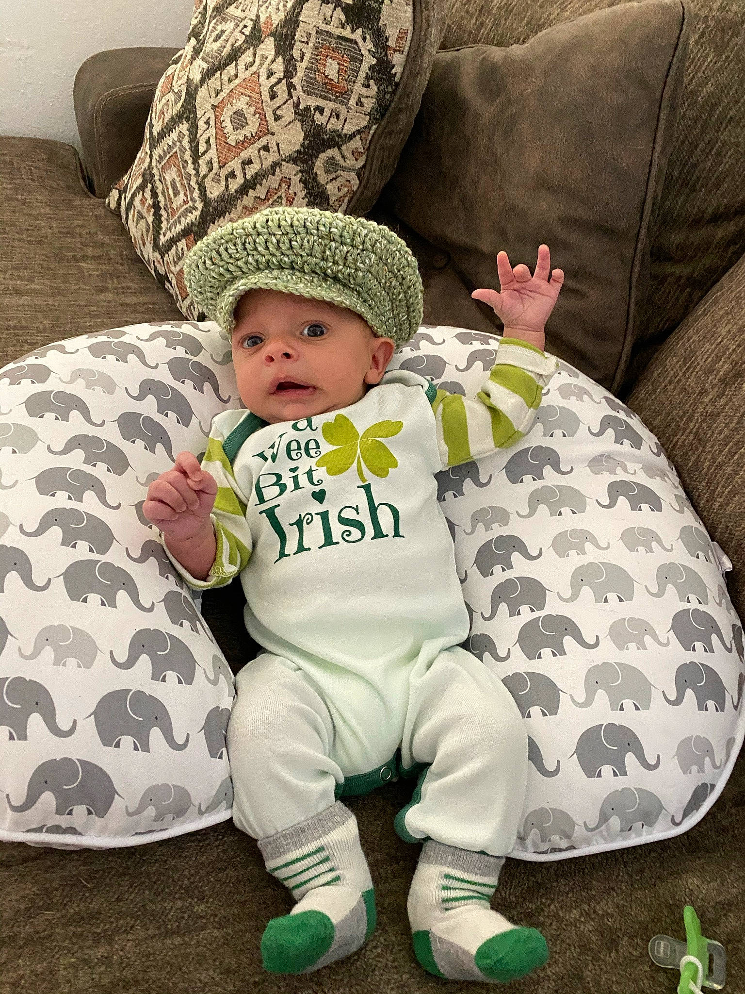 Matteo joined the competition — help win amazing prizes! baby, baby_toddler_clothing, cap, child, comfort, couch, fashion_accessory, fur, grass, happy, hat, headwear, linens, living_room, pattern, person, pillow, room, sitting, sleeve