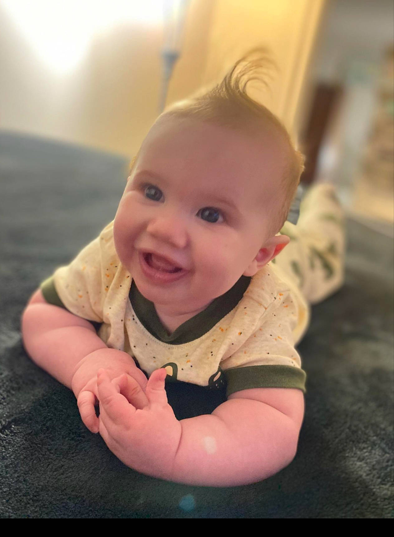 Caden joined the competition — help win amazing prizes! baby, baby_toddler_clothing, cheek, child, eye, eyebrow, finger, flash_photography, flooring, fun, gesture, grass, happy, iris, lip, nose, person, skin, sleeve, smile