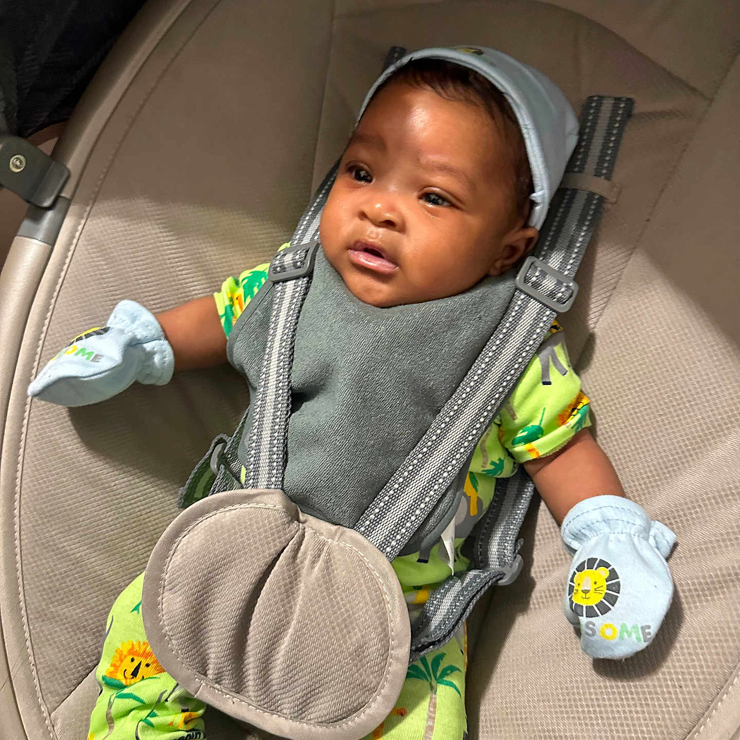 Hudson is registered to the contest to win money with this photo: baby, blackhair, blanket, clothing, cushion, face, glove, hair, happy, hat, head, homedecor, infantbed, person, photography, portrait, sad, sitting, sleeve, smile