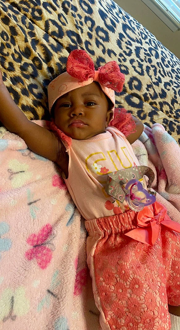 Kalani joined the competition — help win amazing prizes! baby, baby_products, baby_sleeping, baby_toddler_clothing, cap, cheek, child, comfort, eye, eyelash, happy, headwear, linens, lip, magenta, pattern, person, pink, skin, sleeve