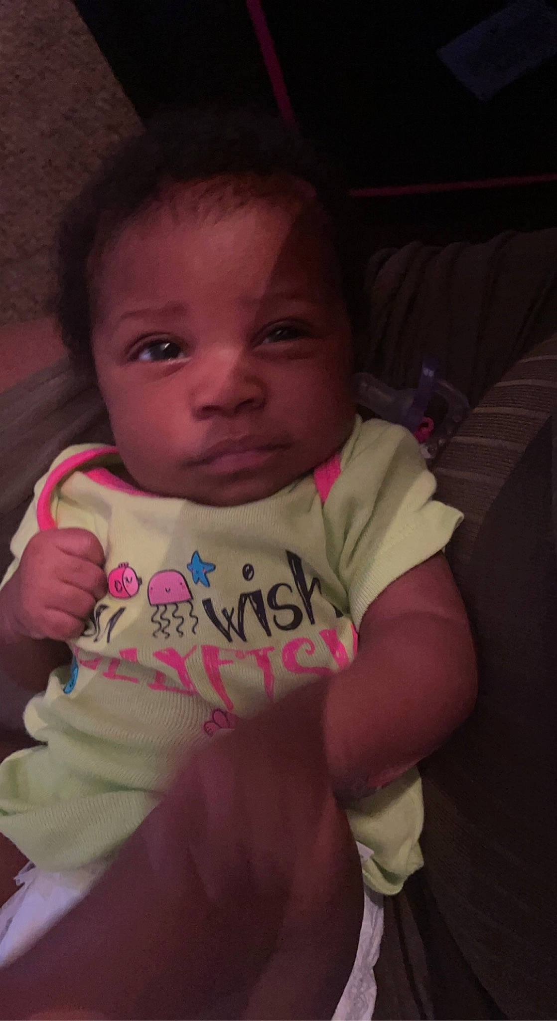 Kalani is registered to the contest to win money with this photo: arm, baby_toddler_clothing, cheek, chin, ear, eye, eyebrow, forehead, hair, hand, happy, head, human_body, iris, lip, mouth, nose, person, purple, skin