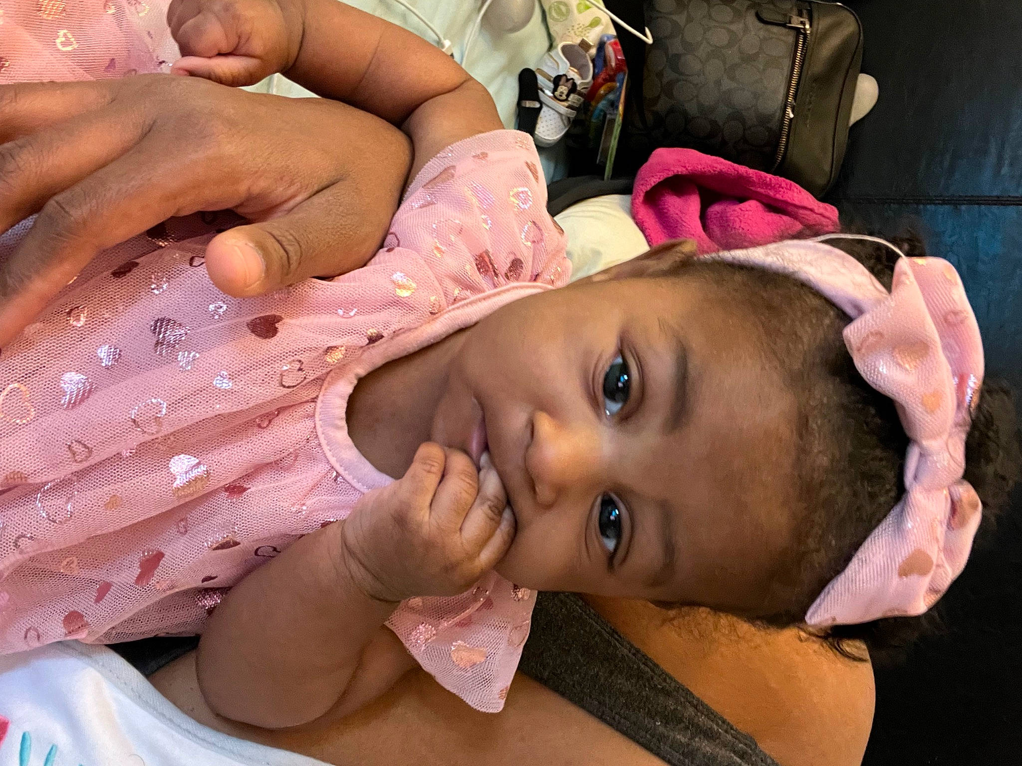 Kaylen is registered to the contest to win money with this photo: baby, cheek, eyebrow, eyelash, face, finger, gesture, hand, happy, head, human_body, lip, mouth, muscle, neck, nose, people, person, pink, skin