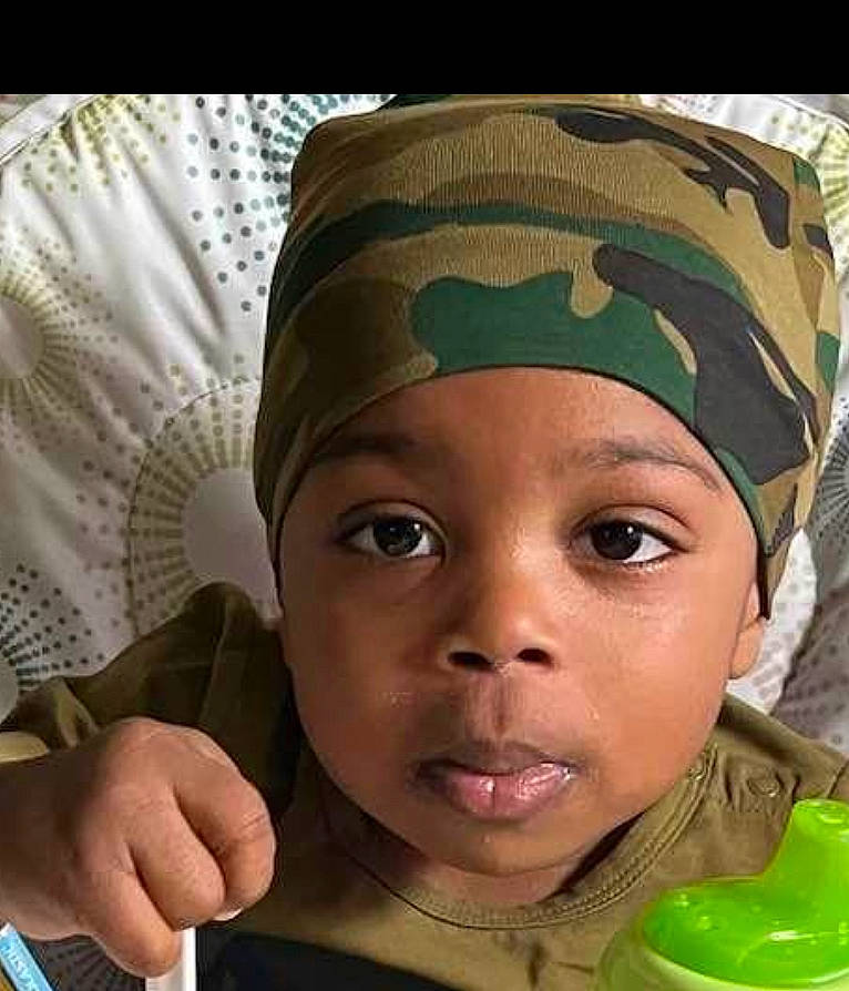 Kayden is registered to the contest to win money with this photo: art, cap, cheek, child, chin, eye, eyebrow, eyelash, face, forehead, gesture, happy, head, headwear, lip, mouth, nose, person, personal_protective_equipment, skin