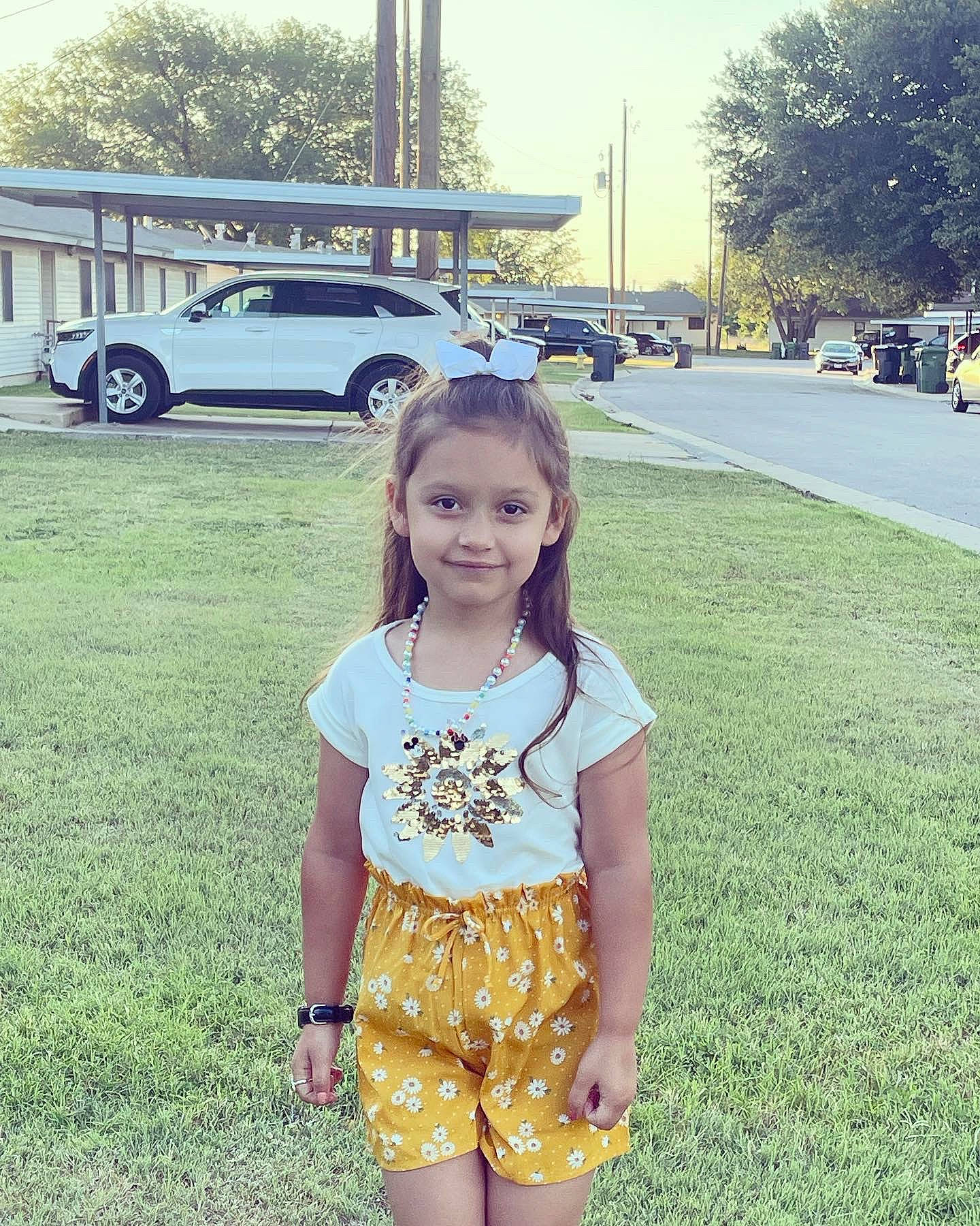 Emilia joined the competition — help win amazing prizes! asphalt, baby_toddler_clothing, car, cool, fun, grass, happy, joy, leisure, long_hair, morning, person, plant, recreation, sleeve, summer, thigh, tire, toddler, tree