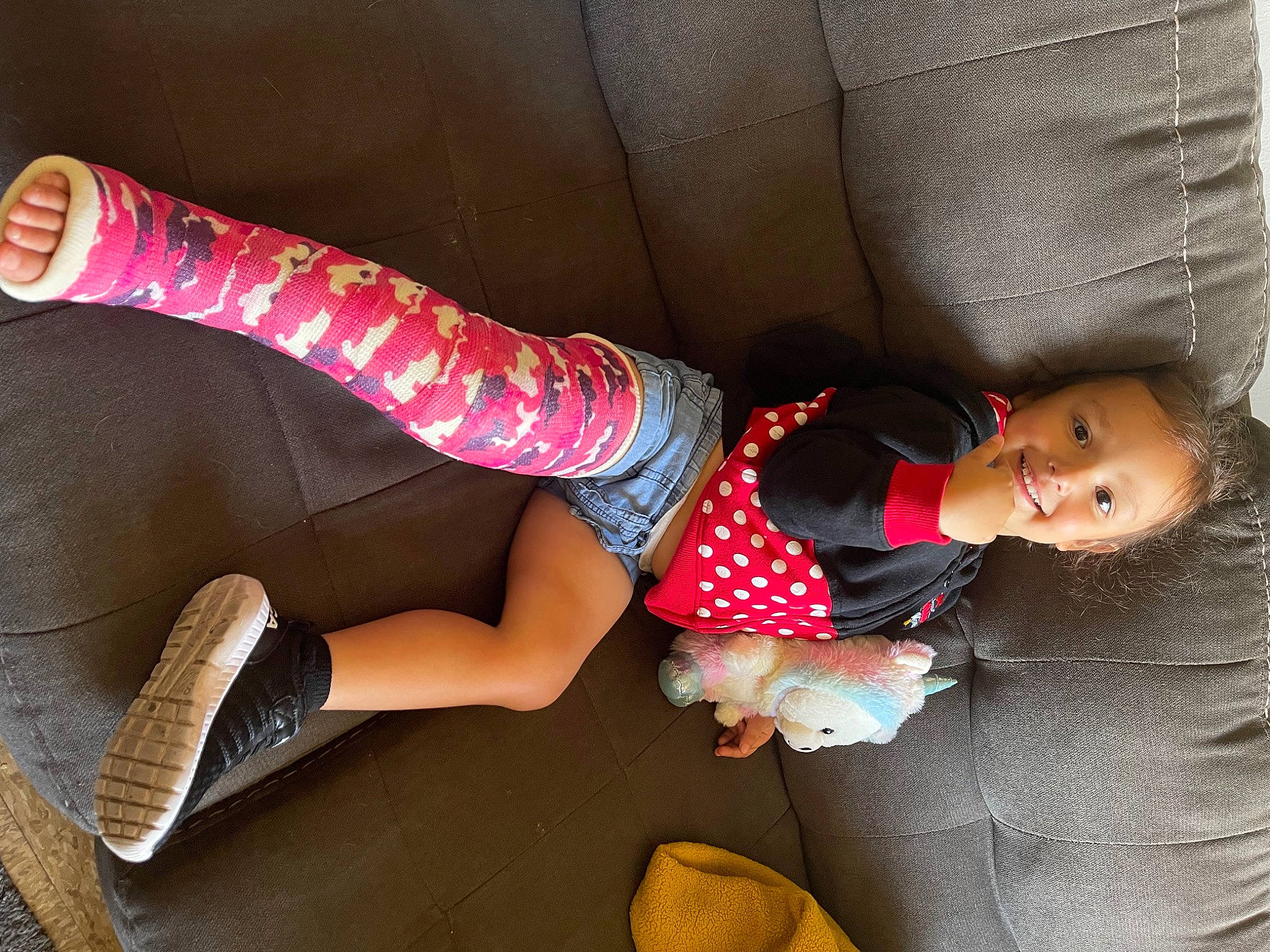 Gabriella is registered to the contest to win money with this photo: baby_toddler_clothing, calf, comfort, elbow, finger, footwear, joint, joy, knee, leg, magenta, pattern, person, pink, shoe, sneakers, sock, sportswear, textile, thigh