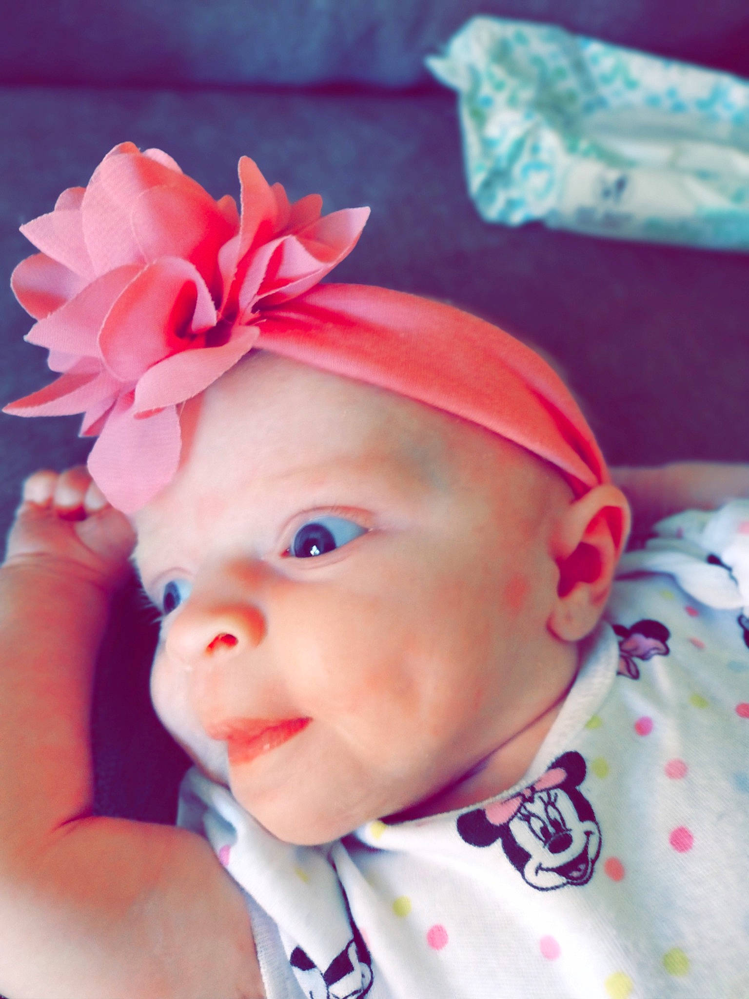 Charlotte is registered to the contest to win money with this photo: baby, baby_toddler_clothing, cap, cheek, child, costume_hat, eyelash, face, happy, hat, headband, headgear, headpiece, headwear, lip, magenta, pattern, person, pink, skin