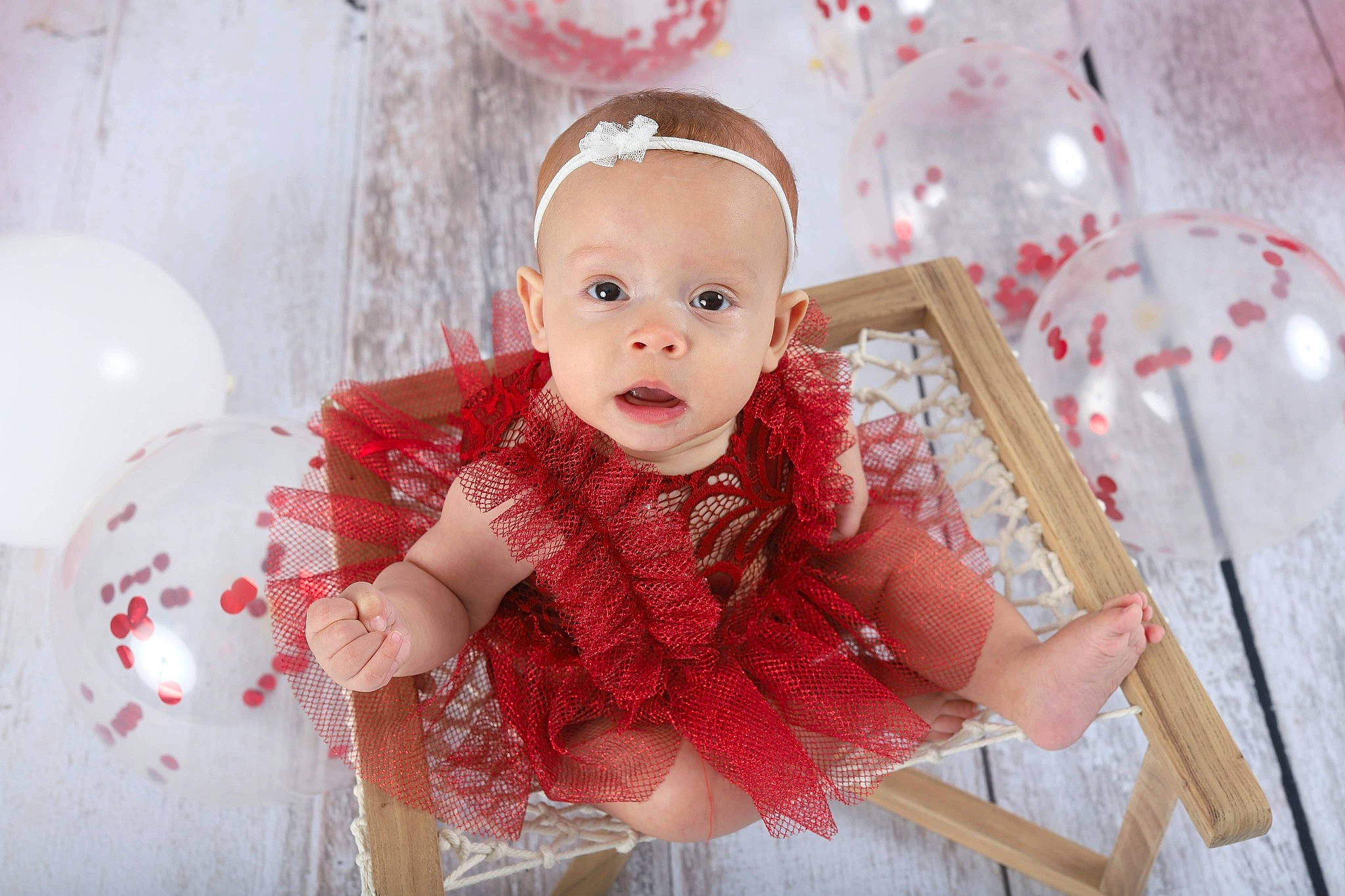 Aryiah is registered to the contest to win money with this photo: baby, baby_toddler_clothing, child, costume_hat, dress, embellishment, event, eye, fashion_accessory, hair_accessory, happy, head, headpiece, jewellery, pattern, peach, person, pink, sleeve, surprise