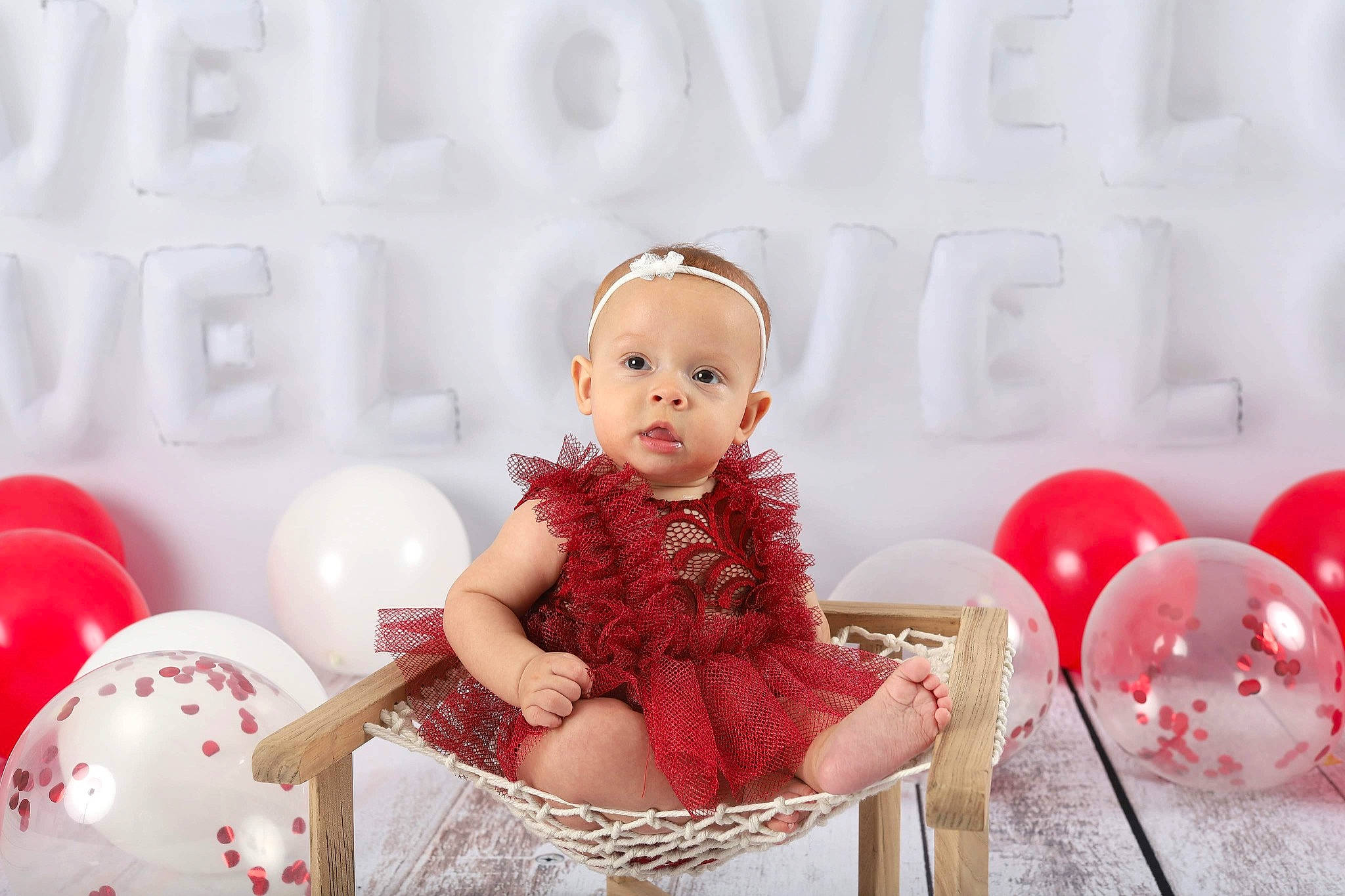 Aryiah joined the competition — help win amazing prizes! baby, baby_toddler_clothing, balloon, chair, child, event, fashion_accessory, fur, happy, magenta, party_supply, pattern, peach, person, pink, red, room, sitting, sleeve, toddler