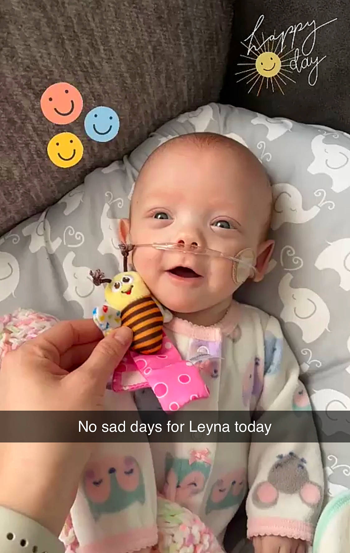 Leyna is registered to the contest to win money with this photo: baby, baby_toddler_clothing, cheek, child, design, finger, gesture, hand, happy, human, linens, magenta, nail, person, pink, product, skin, sweetness, textile, thumb