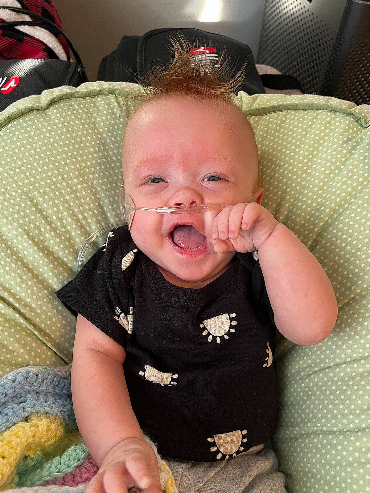 Lennon joined the competition — help win amazing prizes! baby, baby_laughing, baby_products, baby_safety, baby_toddler_clothing, cheek, child, comfort, couch, eye, happy, helmet, iris, mechanical_fan, person, personal_protective_equipment, sitting, skin, sleeve, smile