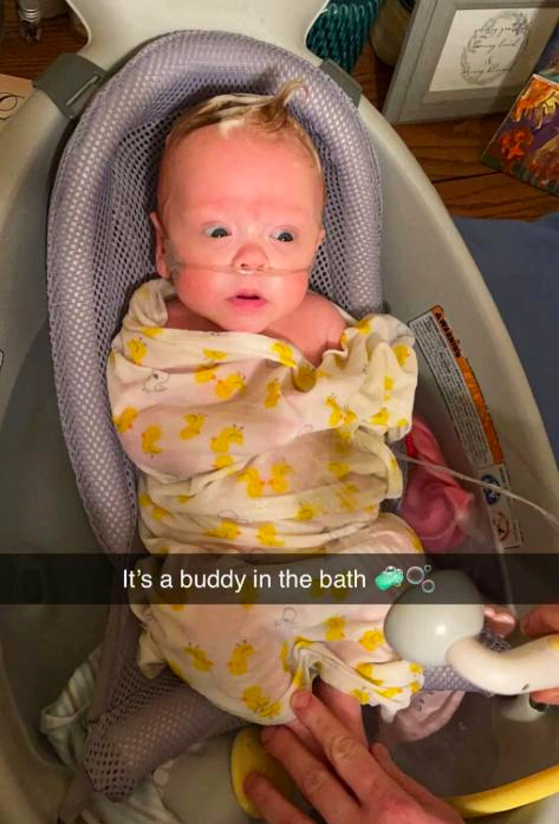 Lennon joined the competition — help win amazing prizes! baby, baby_carriage, baby_in_car_seat, baby_products, baby_safety, baby_toddler_clothing, car_seat, chair, cheek, child, comfort, comfort_food, finger, hand, mouth, nail, person, picture_frame, room, sitting