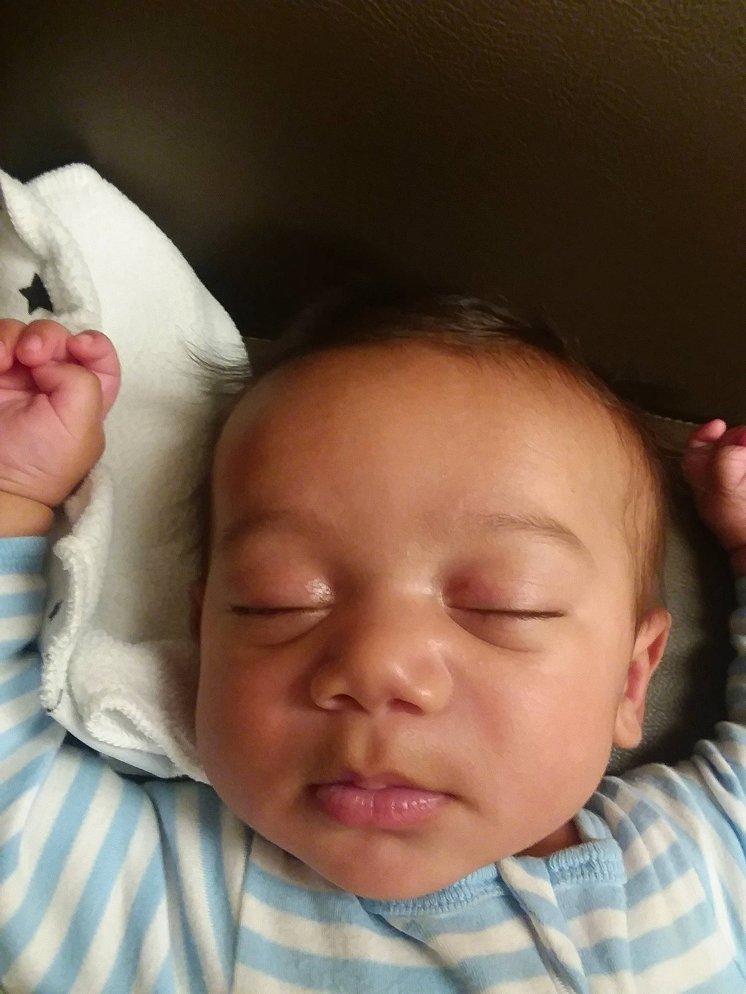 Brison is registered to the contest to win money with this photo: baby, bedtime, cheek, child, chin, eye, face, facial_expression, finger, forehead, gesture, hand, head, lip, mouth, nose, person, skin, sleep, smile