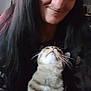 person, cat, long_hair, indoor, pet, face, whiskers, closeup, casual, smile, looking_up, feline, domestic_animal, hair, portrait, friendly, candid, cute, animal, cozy