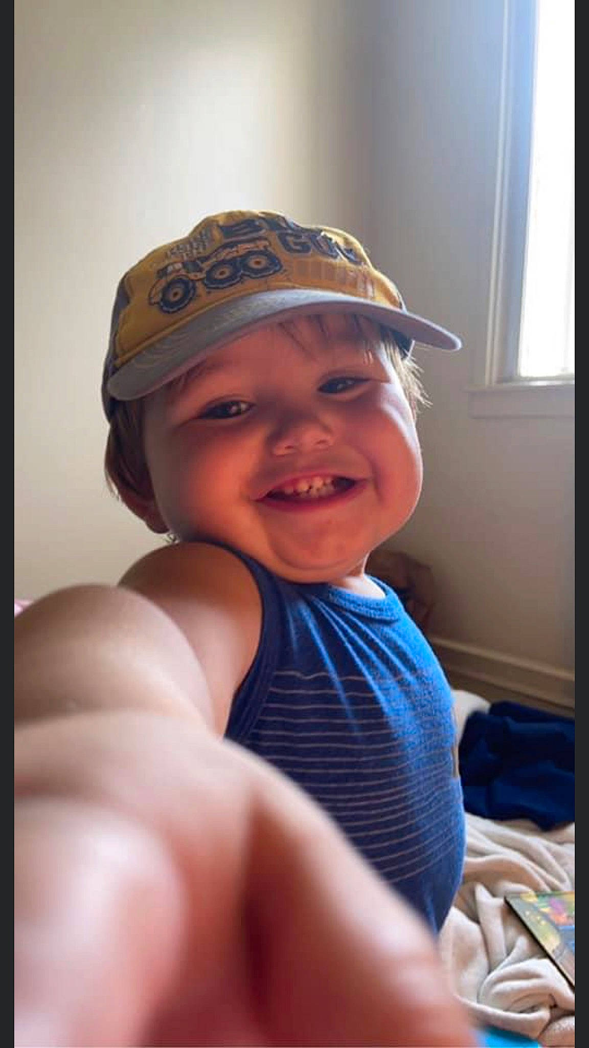 Malakai is registered to the contest to win money with this photo: baseball_cap, cap, chest, elbow, eye, eyewear, finger, gesture, glasses, happy, headwear, human_body, iris, joy, lip, mouth, muscle, neck, person, smile