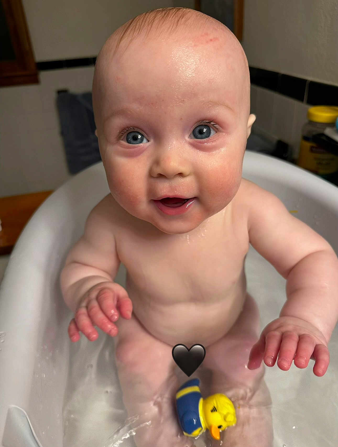 Vander joined the competition — help win amazing prizes! baby, bathtub, bath, child, cute, duck_toy, eyeshadow, face, fun, hands, indoor, infant, looking_up, moist_skin, person, playful, portrait, skin, water, wet