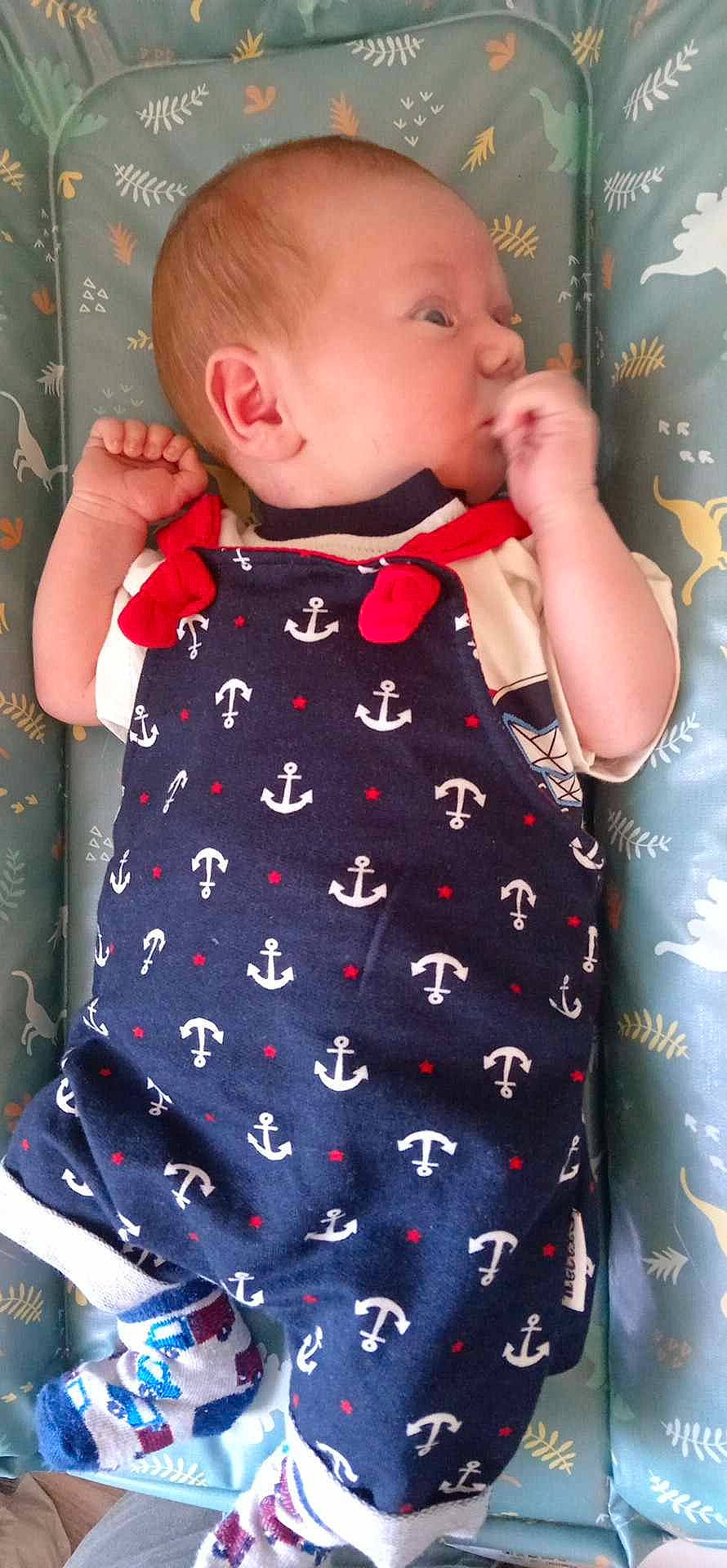 Cédric participe au concours pour gagner de l'argent avec cette photo : baby, baby_toddler_clothing, blond, cheek, child, collar, day_dress, dress, finger, hairstyle, neck, one_piece_garment, pattern, person, pink, product, skin, sleeve, t_shirt, textile