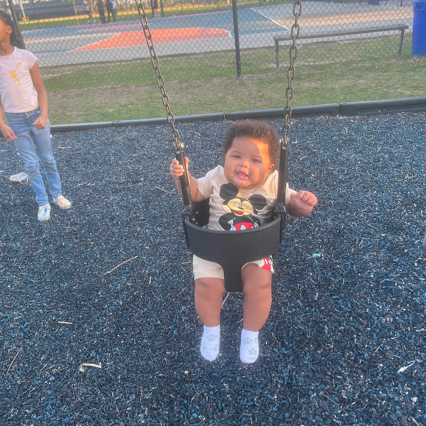 Cameron is registered to the contest to win money with this photo: baby, child, clothing, face, female, footwear, girl, grass, head, nature, outdoorplayarea, outdoors, pants, park, person, photography, plant, playarea, portrait, shoe