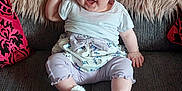 Sadie-Mae joined the competition — help win amazing prizes! baby, child, smiling, sitting, couch, pillow, fluffy, wallpaper, floral, white_top, skirt, leggings, socks, indoor, happy, person, cute, portrait, furniture, home