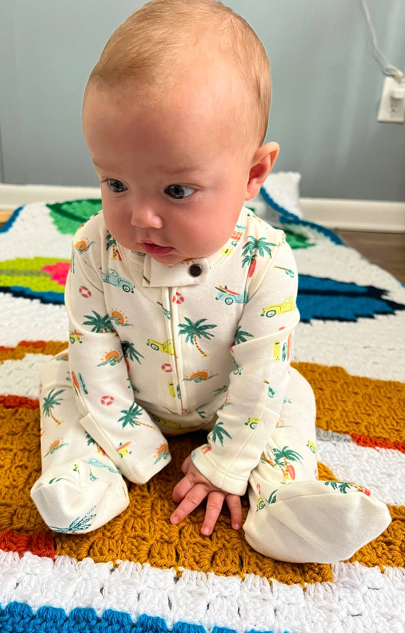 Rhett joined the competition — help win amazing prizes! baby, baby_products, baby_toddler_clothing, barefoot, cheek, child, comfort, crawling, floor, flooring, fun, grass, iris, linens, pattern, person, sitting, skin, sleeve, toddler