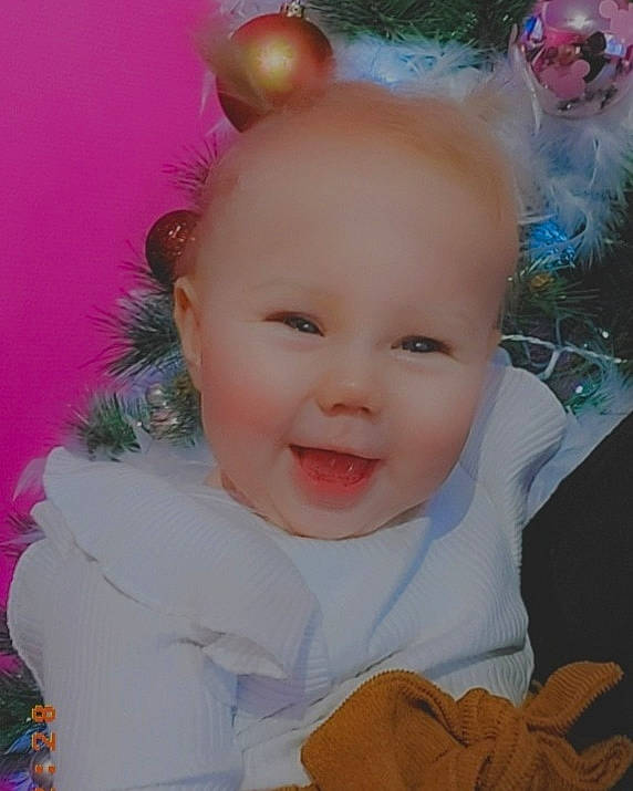 Ayleen participe au concours pour gagner de l'argent avec cette photo : baby, baby_toddler_clothing, cheek, child, christmas_ornament, event, face, facial_expression, fun, grass, happy, headband, iris, people, person, pink, product, skin, smile, toddler