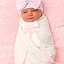newborn, baby, pink_bow, blanket, ribbon, wrapped, hat, infant, soft, cute, portrait, sleepy, pink_background, adorable, child, baby_clothing, headwear, lying_down, closeup, peaceful